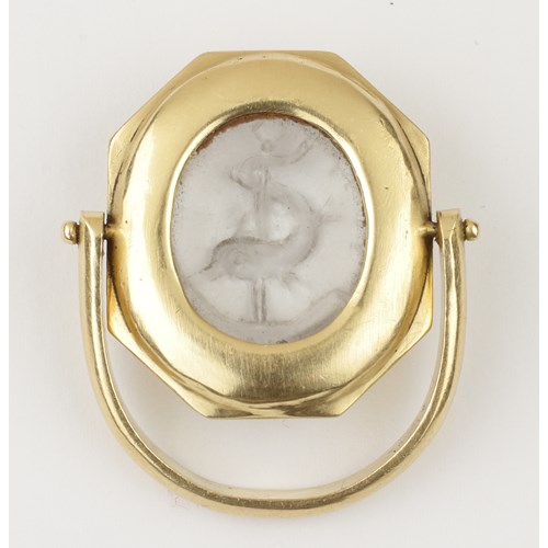 An Early Christian Rock Crystal Intaglio set in a Gold Swivel Ring